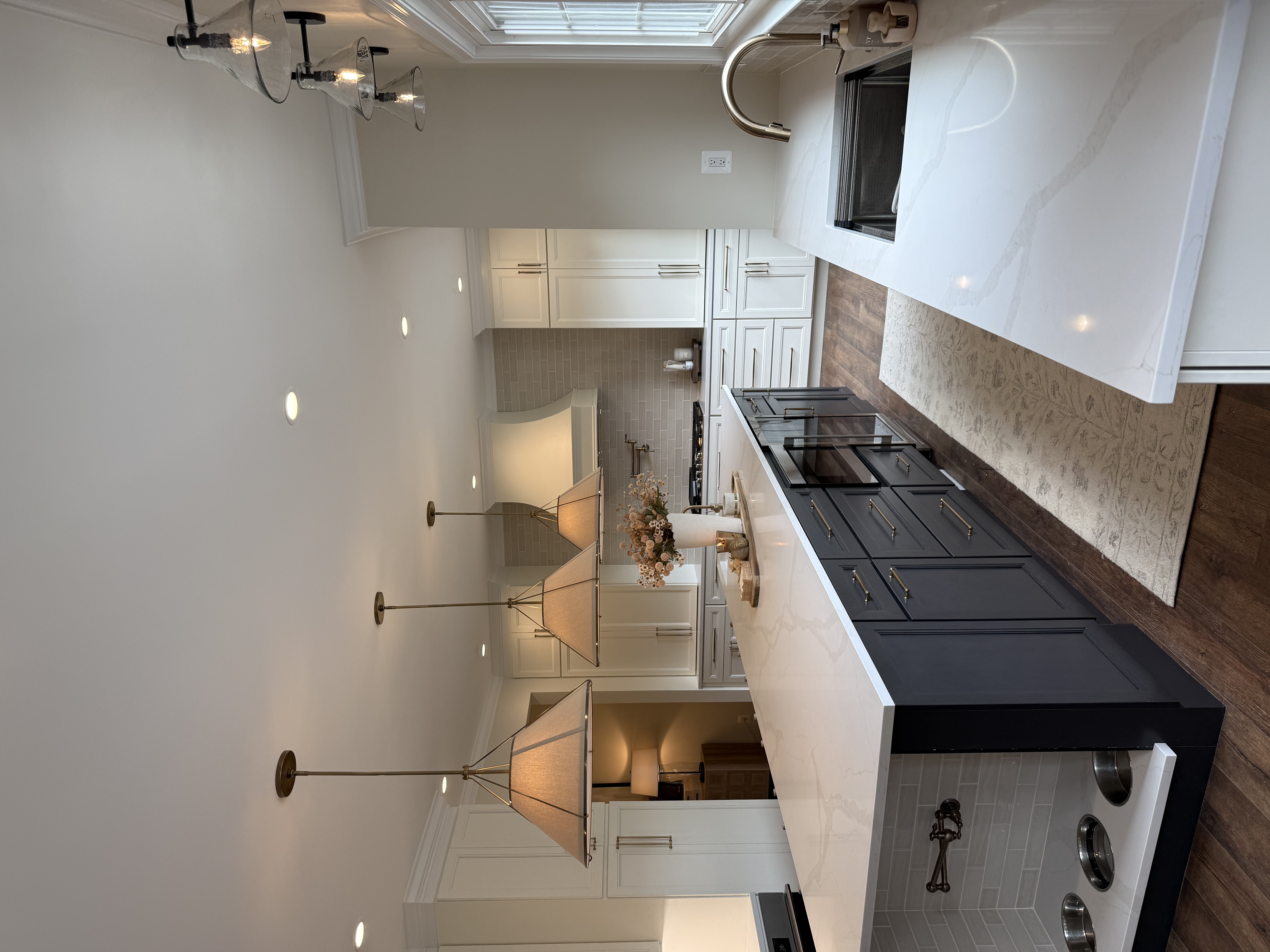 Kitchen remodel — open concept with pendant lighting and dark island